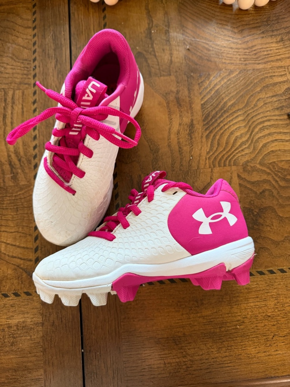 Under Armour Kids White and Hot Pink Cleats - size 11 little kids